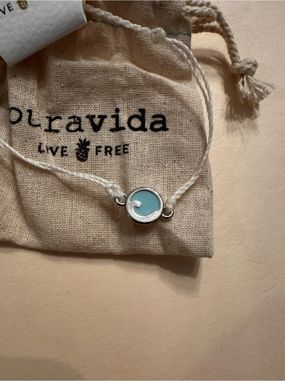 Pura Vida Light Blue Wave Charm Bracelet - White Cord